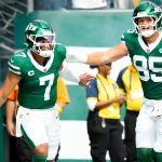 New York Jets quarterback Justin Fields (7) scores a touchdown in the fourth quarter and celebrates with New York Jets tight end Mason Taylor (85), Sunday, September 7, 2025, in East Rutherford.