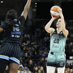 Sep 11, 2025; Chicago, Illinois, USA; New York Liberty guard Sabrina Ionescu (20) shoots against Chicago Sky forward Michaela Onyenwere (12) during the first half at Wintrust Arena. Mandatory Credit: Kamil Krzaczynski-Imagn Images