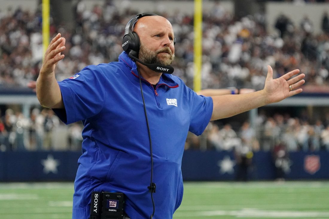 Sep 14, 2025; Arlington, Texas, USA; New York Giants head coach Brian Daboll reacts after a play against the Dallas Cowboys during the third quarter at AT&T Stadium.