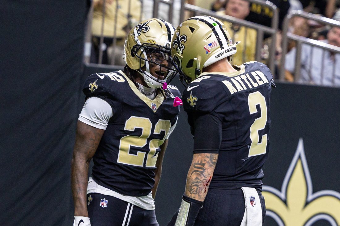Sep 14, 2025; New Orleans, Louisiana, USA; New Orleans Saints wide receiver Rashid Shaheed (22) and quarterback Spencer Rattler (2) celebrate a touchdown against the San Francisco 49ers during the second half at Caesars Superdome. Mandatory Credit: Stephen Lew-Imagn Images