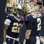 Sep 14, 2025; New Orleans, Louisiana, USA; New Orleans Saints wide receiver Rashid Shaheed (22) and quarterback Spencer Rattler (2) celebrate a touchdown against the San Francisco 49ers during the second half at Caesars Superdome. Mandatory Credit: Stephen Lew-Imagn Images