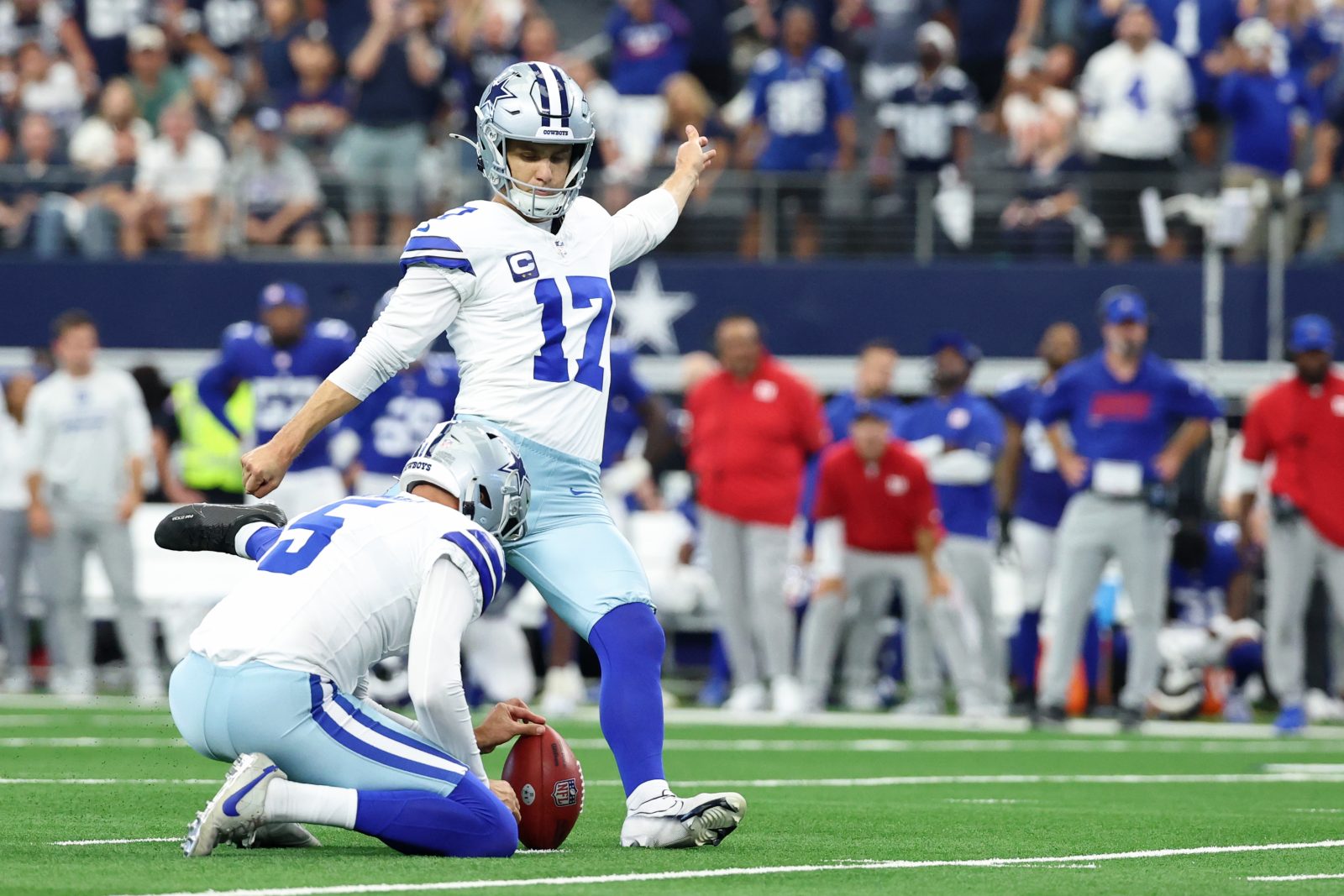 Sep 14, 2025; Arlington, Texas, USA; Dallas Cowboys place kicker Brandon Aubrey (17) kicks the game-winning field goal against the New York Giants during overtime at AT&T Stadium. Mandatory Credit: Kevin Jairaj-Imagn Images
