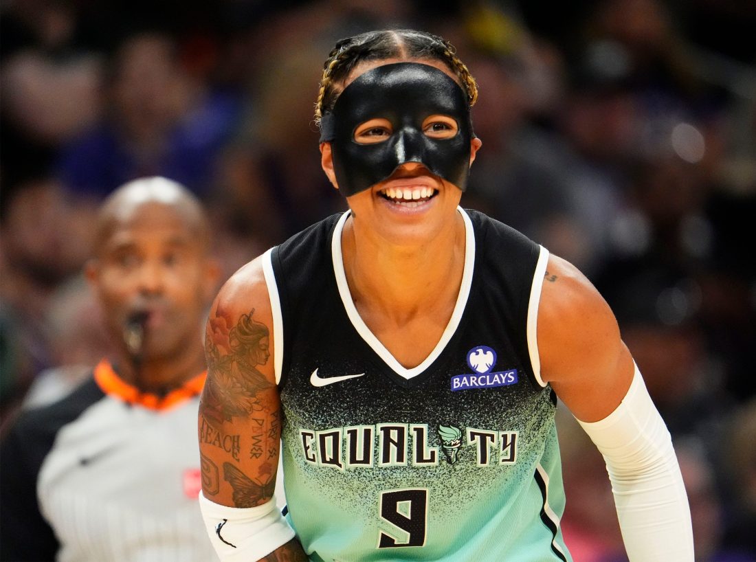 New York Liberty guard Natasha Cloud (9) smiles during action against the Phoenix Mercury in the first half of Game One of the 2025 WNBA Playoffs first round at PHX Arena on Sept. 14, 2025.