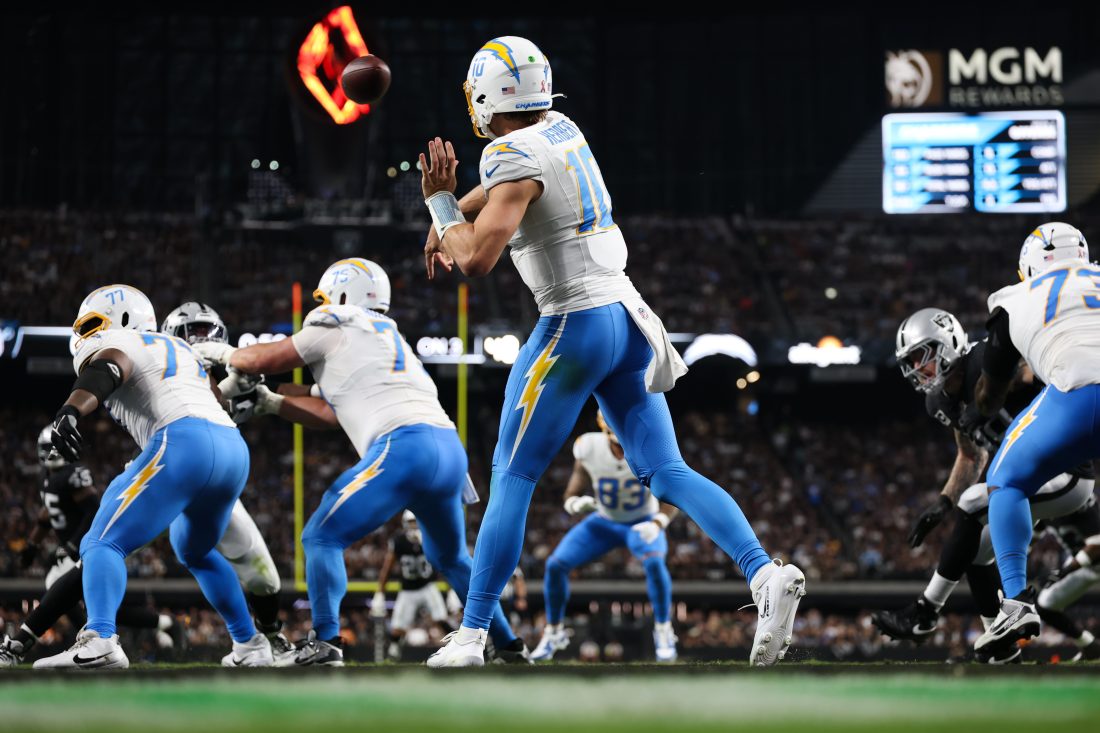 Sep 15, 2025; Paradise, Nevada, USA; Los Angeles Chargers quarterback Justin Herbert (10) throws a pass during the second quarter against the Las Vegas Raiders at Allegiant Stadium. Mandatory Credit: Kiyoshi Mio-Imagn Images