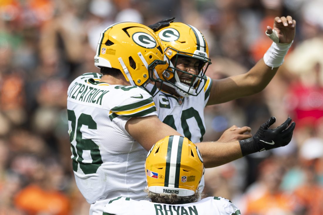 Sep 21, 2025; Cleveland, Ohio, USA; Green Bay Packers tight end John FitzPatrick (86) celebrates a touchdown with quarterback Jordan Love (10) during the third quarter against the Cleveland Browns at Huntington Bank Field.