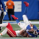 Leo Chenal (54) defends against New York Giants quarterback Russell Wilson (3) in the fourth quarter at MetLife Stadium. Mandatory Credit: Robert Deutsch-Imagn Images