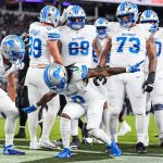 Detroit Lions running back Jahmyr Gibbs celebrates a touchdown against the Baltimore Ravens with wide receiver Amon-Ra St. Brown and the offensive line during the first half at M&T Bank Stadium in Baltimore, Md. on Monday, Sept. 22, 2025.