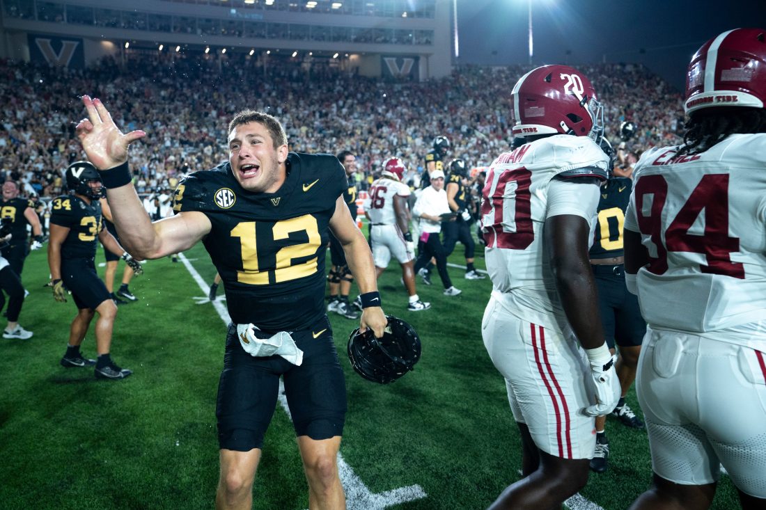 Vanderbilt Commodores quarterback Brennan Storer (12) celebrates after knocking off the Alabama Crimson Tide 40-35 at Vanderbilt Stadium in Nashville, Tenn., Saturday, Oct. 5, 2024.