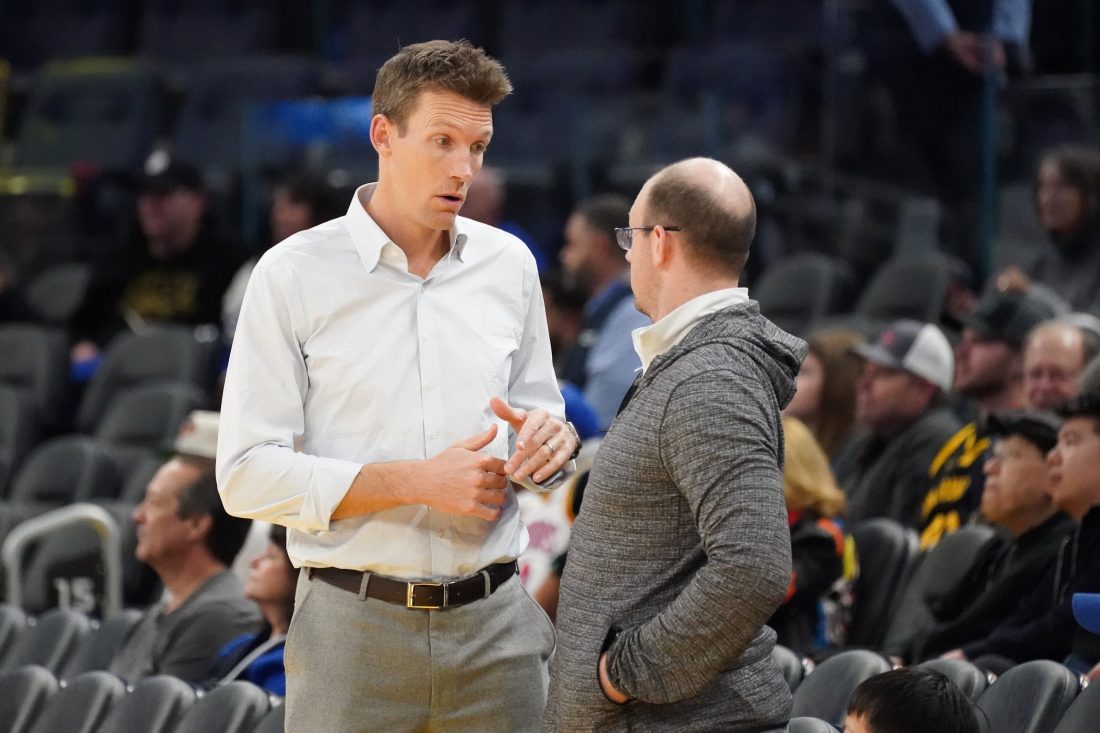 Jan 4, 2025; San Francisco, California, USA; Golden State Warriors general manager Mike Dunleavy chats before the game against the Memphis Grizzlies at Chase Center.