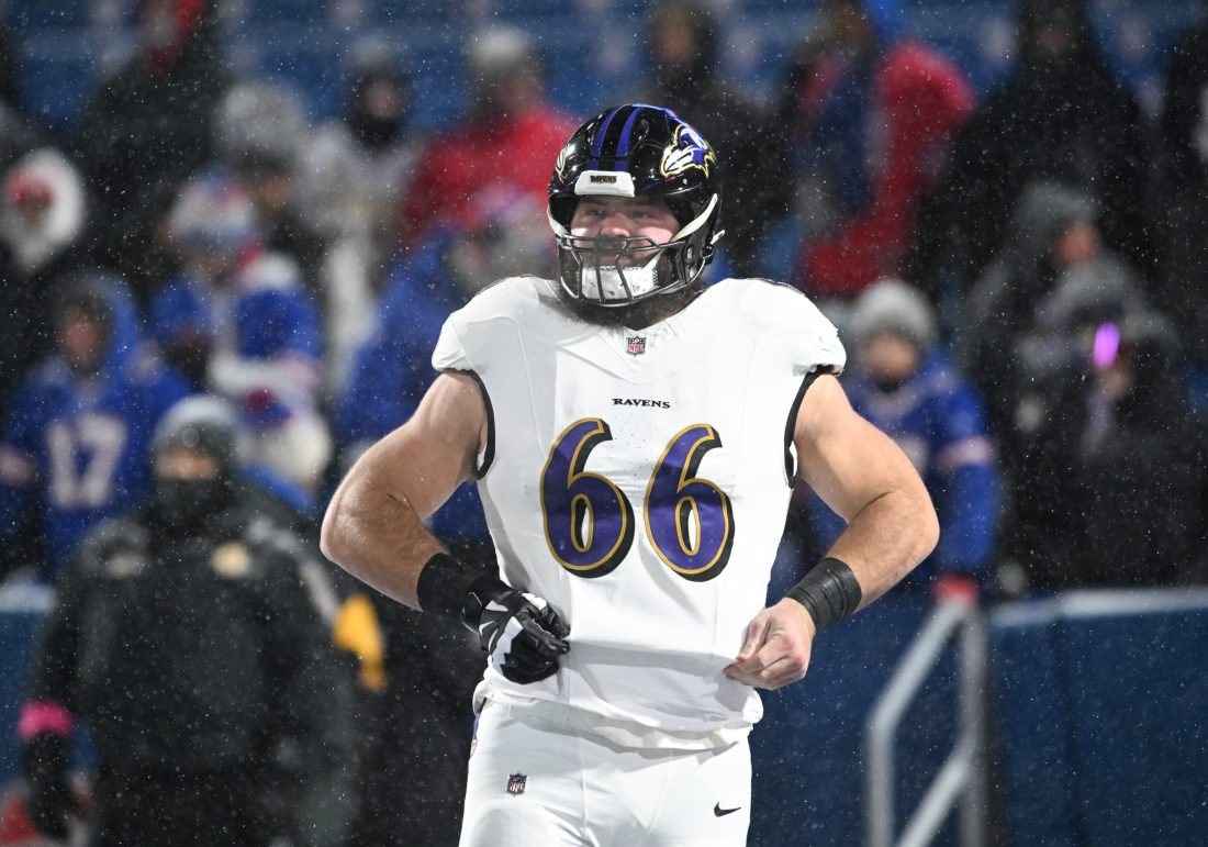 Jan 19, 2025; Orchard Park, New York, USA; Baltimore Ravens guard Ben Cleveland (66) looks on during warm ups before the game against the Buffalo Bills in a 2025 AFC divisional round game at Highmark Stadium. Mandatory Credit: Mark Konezny-Imagn Images