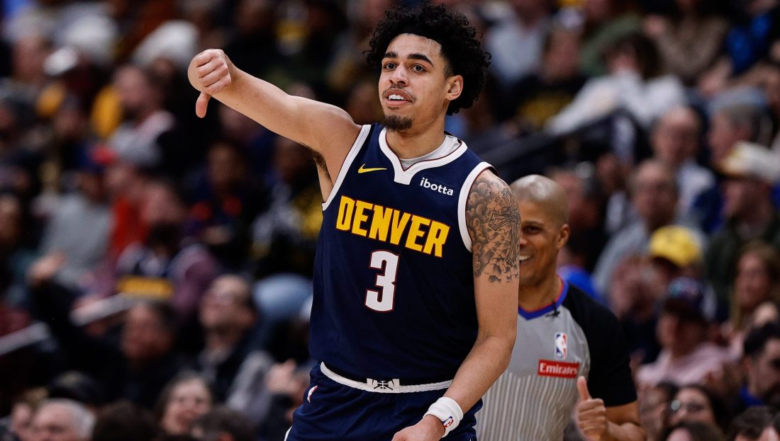 Feb 12, 2025; Denver, Colorado, USA; Denver Nuggets guard Julian Strawther (3) reacts after a play in the second quarter against the Portland Trail Blazers at Ball Arena. Mandatory Credit: Isaiah J. Downing-Imagn Images