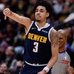 Feb 12, 2025; Denver, Colorado, USA; Denver Nuggets guard Julian Strawther (3) reacts after a play in the second quarter against the Portland Trail Blazers at Ball Arena. Mandatory Credit: Isaiah J. Downing-Imagn Images