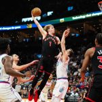 Feb 21, 2025; Toronto, Ontario, CAN; Toronto Raptors guard Gradey Dick (1) drives to the net against Miami Heat forward Duncan Robinson (55) at Scotiabank Arena. Mandatory Credit: Kevin Sousa-Imagn Images