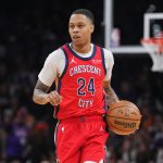Feb 28, 2025; Phoenix, Arizona, USA; New Orleans Pelicans guard Jordan Hawkins (24) dribbles against the Phoenix Suns during the first half at Footprint Center. Mandatory Credit: Joe Camporeale-Imagn Images