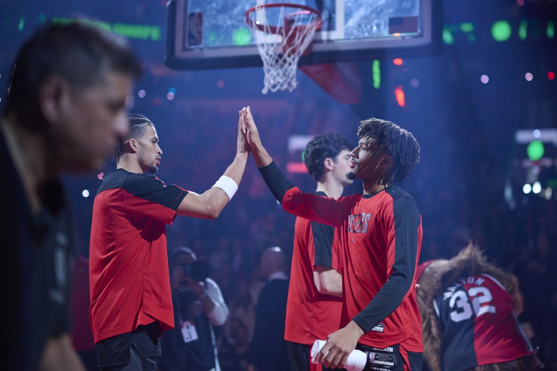 Mar 23, 2025; Portland, Oregon, USA; Portland Trail Blazers guard Shaedon Sharpe (17) high fives forward Toumani Camara (33) before a game against the Boston Celtics at Moda Center. Mandatory Credit: Troy Wayrynen-Imagn Images