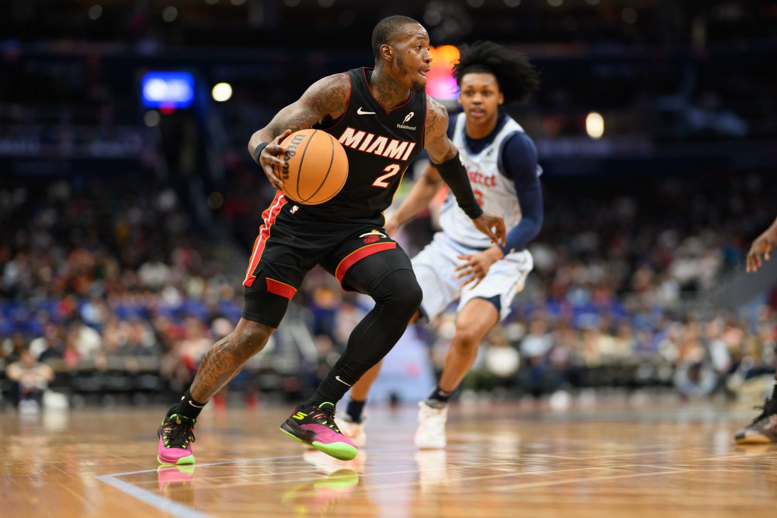 Mar 31, 2025; Washington, District of Columbia, USA; Miami Heat guard Terry Rozier (2) drives to the basket during the second quarter against the Washington Wizards at Capital One Arena.