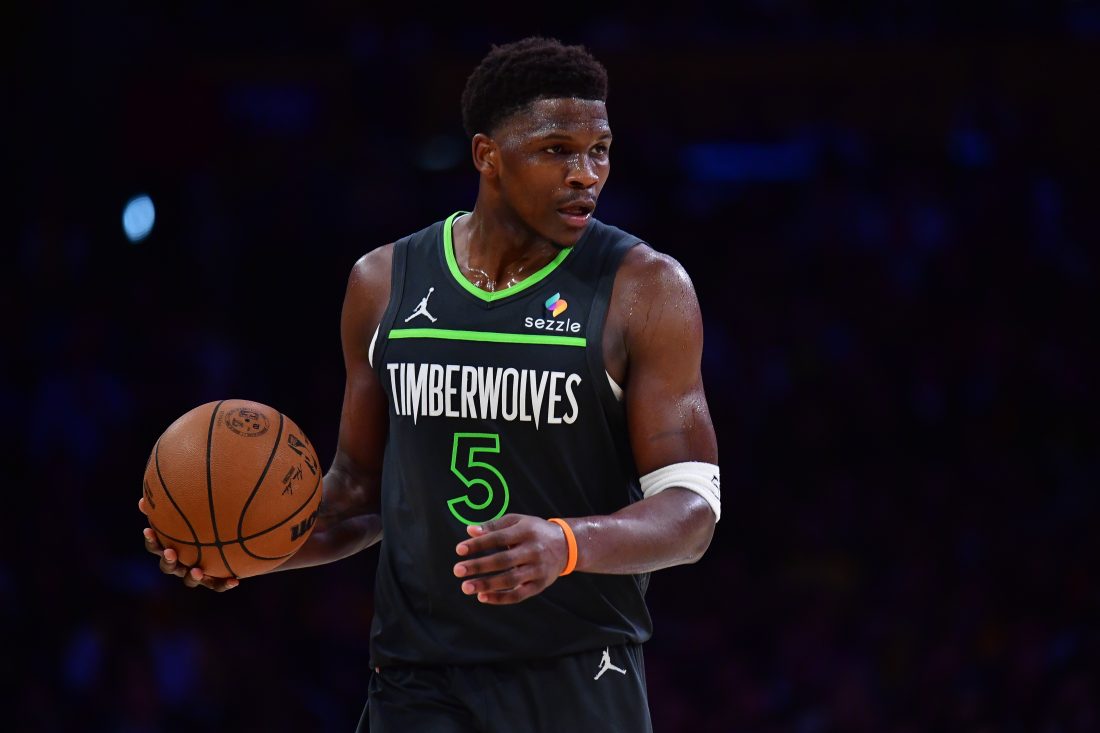 Apr 30, 2025; Los Angeles, California, USA; Minnesota Timberwolves guard Anthony Edwards (5) moves the ball against the Los Angeles Lakers during the second half in game five of first round for the 2025 NBA Playoffs at Crypto.com Arena. Mandatory Credit: Gary A. Vasquez-Imagn Images