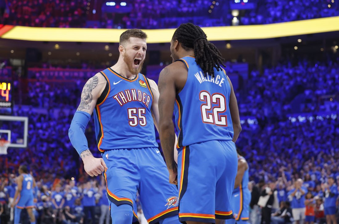 May 18, 2025; Oklahoma City, Oklahoma, USA; Oklahoma City Thunder center Isaiah Hartenstein (55) and guard Cason Wallace (22) celebrate a basket against the Denver Nuggets in the second half during game seven of the second round for the 2025 NBA Playoffs at Paycom Center. Mandatory Credit: Alonzo Adams-Imagn Images