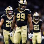Aug 23, 2025; New Orleans, Louisiana, USA; New Orleans Saints defensive end Chase Young (99) looks on against the Denver Broncos during the first half at Caesars Superdome. Mandatory Credit: Stephen Lew-Imagn Images