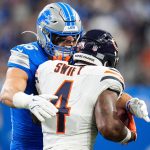 Detroit Lions linebacker Jack Campbell (46) tackles Chicago Bears running back D'Andre Swift (4) during the first half at Ford Field in Detroit on Sunday, Sept. 14, 2025.