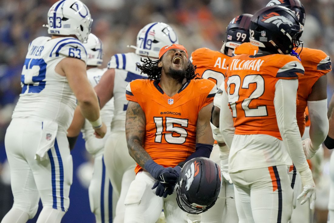 Sep 14, 2025; Indianapolis, Indiana, USA; Denver Broncos linebacker Nik Bonitto (15) reacts after a missed field goal by Indianapolis Colts place kicker Spencer Shrader (3) at Lucas Oil Stadium. Mandatory Credit: INDIANAPOLIS STAR-USA TODAY Network via Imagn Images