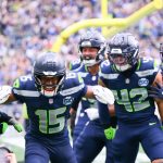 Sep 21, 2025; Seattle, Washington, USA; Seattle Seahawks wide receiver Tory Horton (15) celebrates after scoring a 95 yard punt return for a touchdown against the New Orleans Saints during the first quarter at Lumen Field. Mandatory Credit: Steven Bisig-Imagn Images