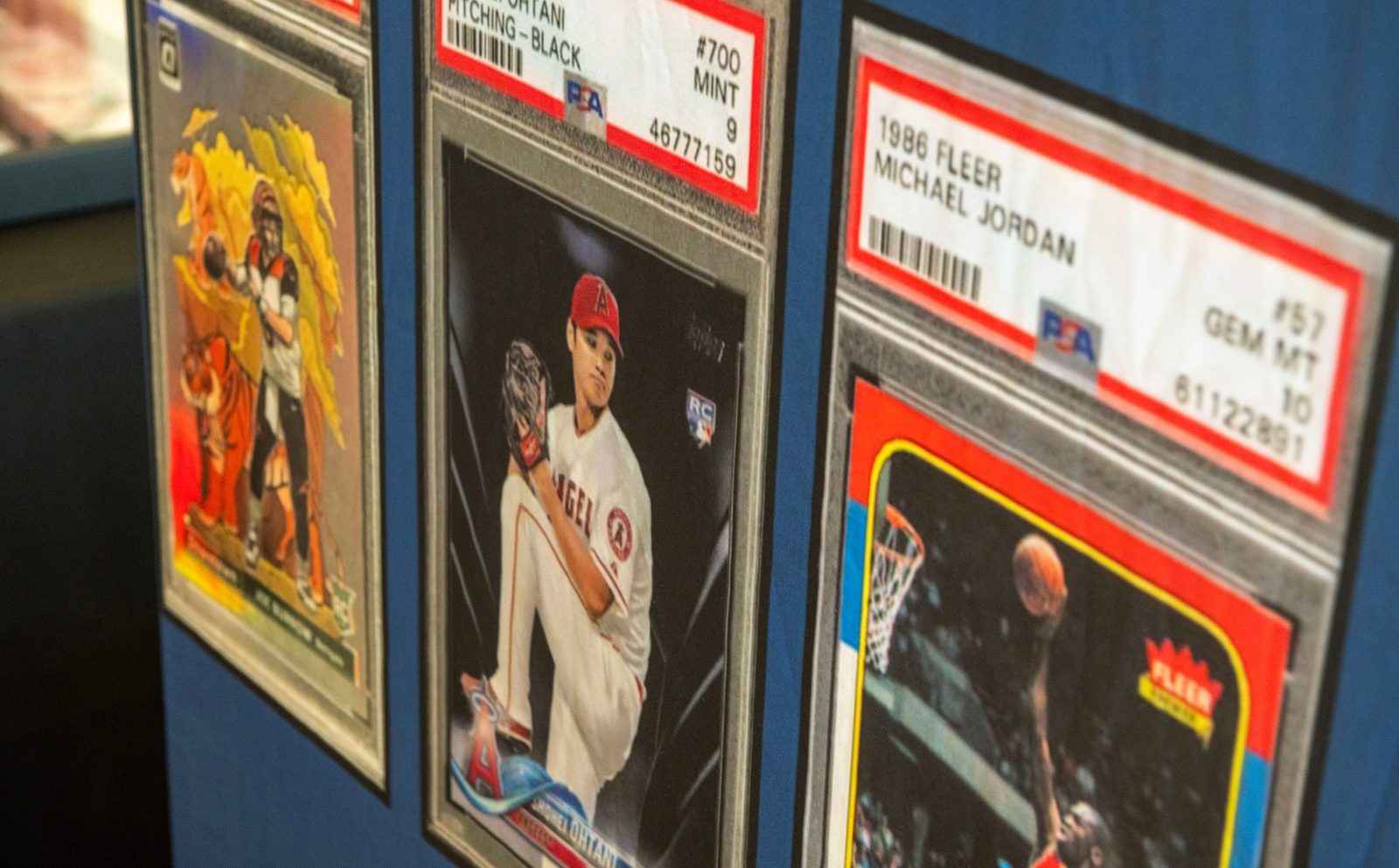 Card collectors check out the items for sale duing Cards on the Coast Sports Card and TCG Show Saturday, Sept. 27, 2025 at Sanders Beach Corrine Jones Resource Center. The show had sports cards, collectable trading card games, food trucks and more.