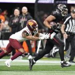 Sep 28, 2025; Atlanta, Georgia, USA; Atlanta Falcons running back Tyler Allgeier (25) breaks away from Washington Commanders cornerback Marshon Lattimore (2) during the second half at Mercedes-Benz Stadium. Mandatory Credit: Dale Zanine-Imagn Images
