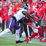 Sep 28, 2025; Kansas City, Missouri, USA; Kansas City Chiefs wide receiver Hollywood Brown (5) runs after making a catch as Baltimore Ravens cornerback Chidobe Awuzie (3) defends during the first half at GEHA Field at Arrowhead Stadium.