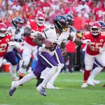 Sep 28, 2025; Kansas City, Missouri, USA; Baltimore Ravens quarterback Lamar Jackson (8) scrambles during the third quarter against the Kansas City Chiefs at GEHA Field at Arrowhead Stadium.