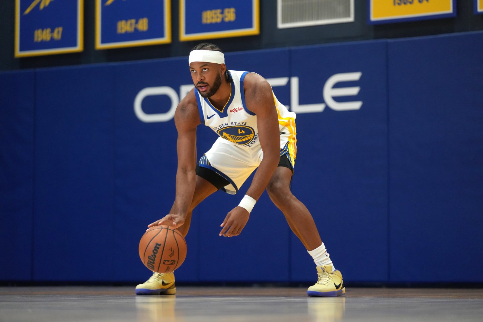 Sep 29, 2025; San Francisco, CA, USA; Golden State Warriors guard Moses Moody (4) dribbles the ball during Media Day at the Chase Center. Mandatory Credit: Cary Edmondson-Imagn Images