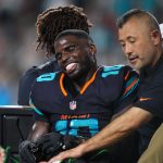 Sep 29, 2025; Miami Gardens, Florida, USA; Miami Dolphins wide receiver Tyreek Hill (10) is tended to by medical staff after injuring his leg against the New York Jets during the second half at Hard Rock Stadium.