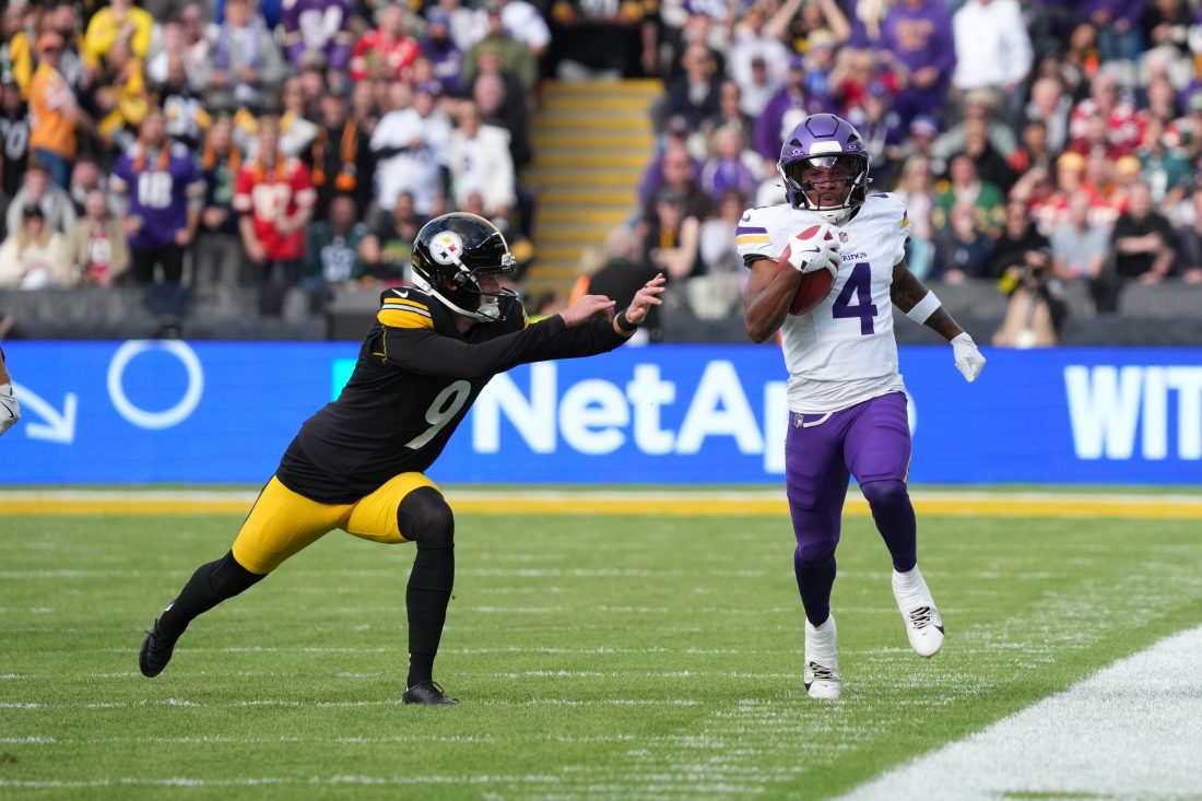 Sep 28, 2025; Dublin, Ireland; Minnesota Vikings wide receiver Myles Price (4) carries the ball on a kickoff return against Pittsburgh Steelers kicker Chris Boswell (9) in the second half during an NFL International Series game at Croke Park. Mandatory Credit: Kirby Lee-Imagn Images