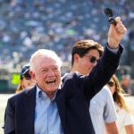 Oct 5, 2025; East Rutherford, New Jersey, USA; Dallas Cowboys Owner, President and general manager Jerry Jones waves on the field prior to a game against the New York Jets at MetLife Stadium.