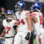 Oct 5, 2025; New Orleans, Louisiana, USA; New York Giants wide receiver Wan'Dale Robinson (17), New York Giants tight end Theo Johnson (84) and New York Giants wide receiver Darius Slayton (18) celebrate after a touchdown against the New Orleans Saints during the second quarter at Caesars Superdome. Mandatory Credit: Matthew Hinton-Imagn Images