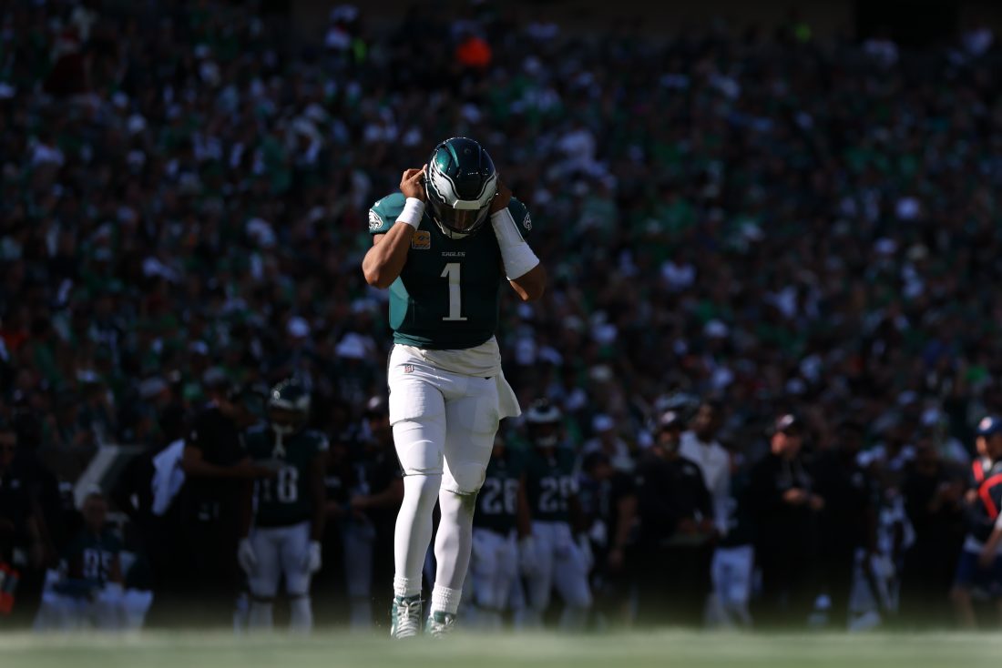 Oct 5, 2025; Philadelphia, Pennsylvania, USA; Philadelphia Eagles quarterback Jalen Hurts (1) walks onto the field after a break in action against the Denver Broncos during the third quarter at Lincoln Financial Field.