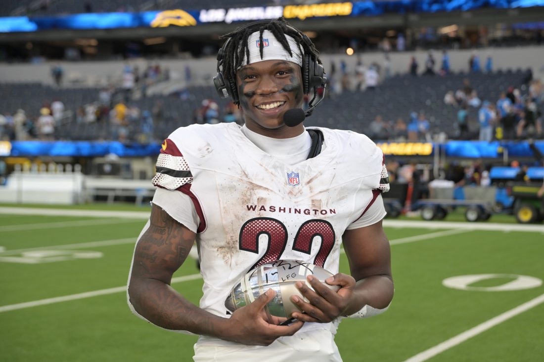 Oct 5, 2025; Inglewood, California, USA; Washington Commanders running back Jacory Croskey-Merritt (22) is interviewed after the game against the Los Angeles Chargers at SoFi Stadium.