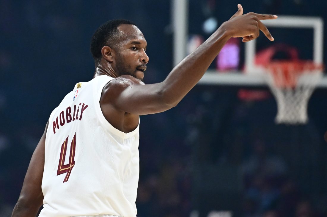 Oct 7, 2025; Cleveland, Ohio, USA; Cleveland Cavaliers forward Evan Mobley (4) celebrates after hitting a three point basket during the first quarter against the Chicago Bulls at Rocket Arena.