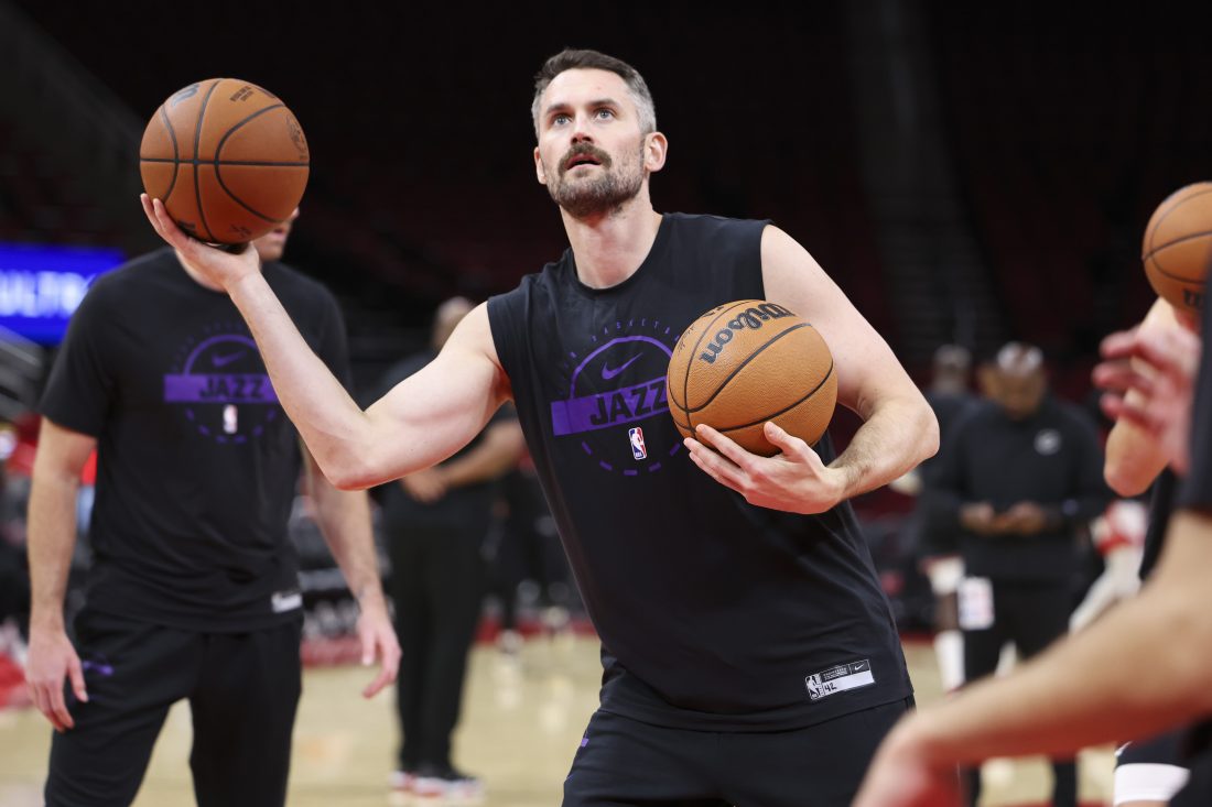 Oct 8, 2025; Houston, Texas, USA; Utah Jazz forward Kevin Love (42) warms up before the game against the Houston Rockets at Toyota Center. Mandatory Credit: Troy Taormina-Imagn Images