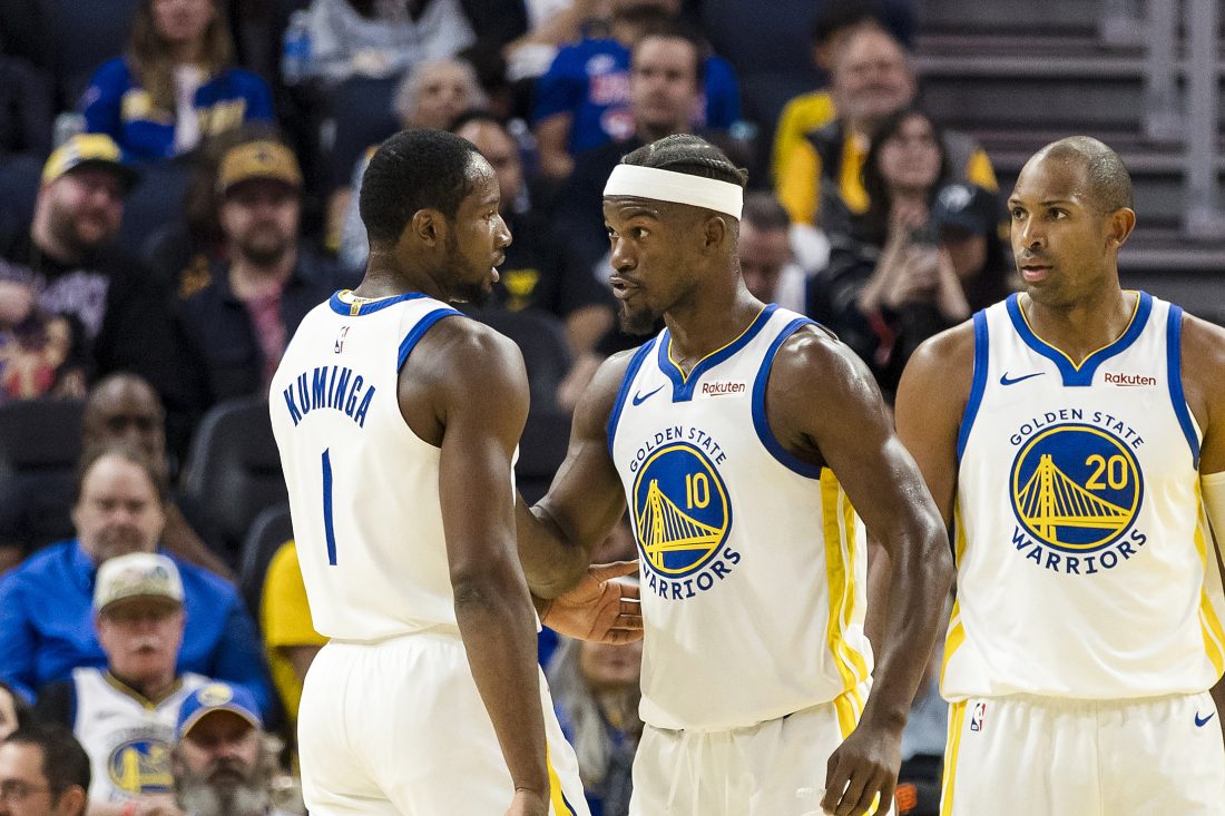 Oct 8, 2025; San Francisco, California, USA; Golden State Warriors forward Jimmy Butler III (10) reacts towards forward Jonathan Kuminga (1) during the second quarter against the Portland Trail Blazers at Chase Center. Mandatory Credit: John Hefti-Imagn Images