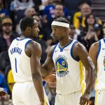 Oct 8, 2025; San Francisco, California, USA; Golden State Warriors forward Jimmy Butler III (10) reacts towards forward Jonathan Kuminga (1) during the second quarter against the Portland Trail Blazers at Chase Center. Mandatory Credit: John Hefti-Imagn Images
