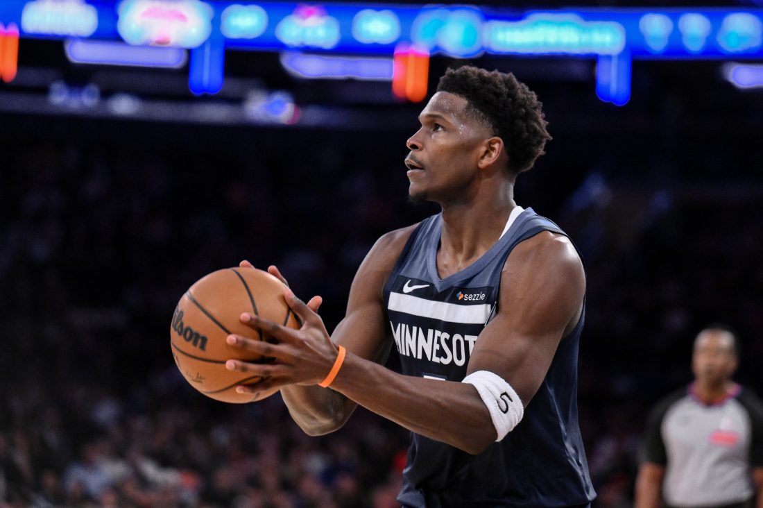 Oct 9, 2025; New York, New York, USA; Minnesota Timberwolves guard Anthony Edwards (5) shoots the ball against the New York Knicks during the first half at Madison Square Garden.