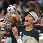 Oct 10, 2025; Phoenix, Arizona, USA; Las Vegas Aces center A'ja Wilson (22) celebrates with teammates after game four of the 2025 WNBA Finals at Mortgage Matchup Center. Mandatory Credit: Joe Camporeale-Imagn Images