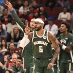 Oct 12, 2025; Chicago, Illinois, USA; Milwaukee Bucks guard Gary Trent Jr. (5) points after scoring against the Chicago Bulls during the first half at the United Center. Mandatory Credit: Matt Marton-Imagn Images