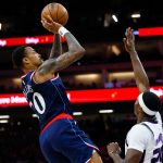 Oct 15, 2025; Sacramento, California, USA; Los Angeles Clippers forward John Collins (20) shoots the ball against Sacramento Kings guard Daeqwon Plowden (29) during the fourth quarter at Golden 1 Center. Mandatory Credit: Sergio Estrada-Imagn Images