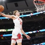 Oct 16, 2025; Chicago, Illinois, USA; Chicago Bulls forward Matas Buzelis (14) goes up for a dunk against the Minnesota Timberwolves during the second half at United Center. Mandatory Credit: David Banks-Imagn Images