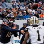 Oct 19, 2025; Chicago, Illinois, USA; Chicago Bears quarterback Caleb Williams (18) throws a pass against New Orleans Saints cornerback Alontae Taylor (1) during the first half at Soldier Field. Mandatory Credit: David Banks-Imagn Images