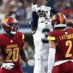 Oct 19, 2025; Arlington, Texas, USA; Dallas Cowboys wide receiver George Pickens (3) celebrates after a play as Washington Commanders safety Quan Martin (20) and cornerback Marshon Lattimore (2) look on during the second quarter of the game at AT&T Stadium. Mandatory Credit: Kevin Jairaj-Imagn Images