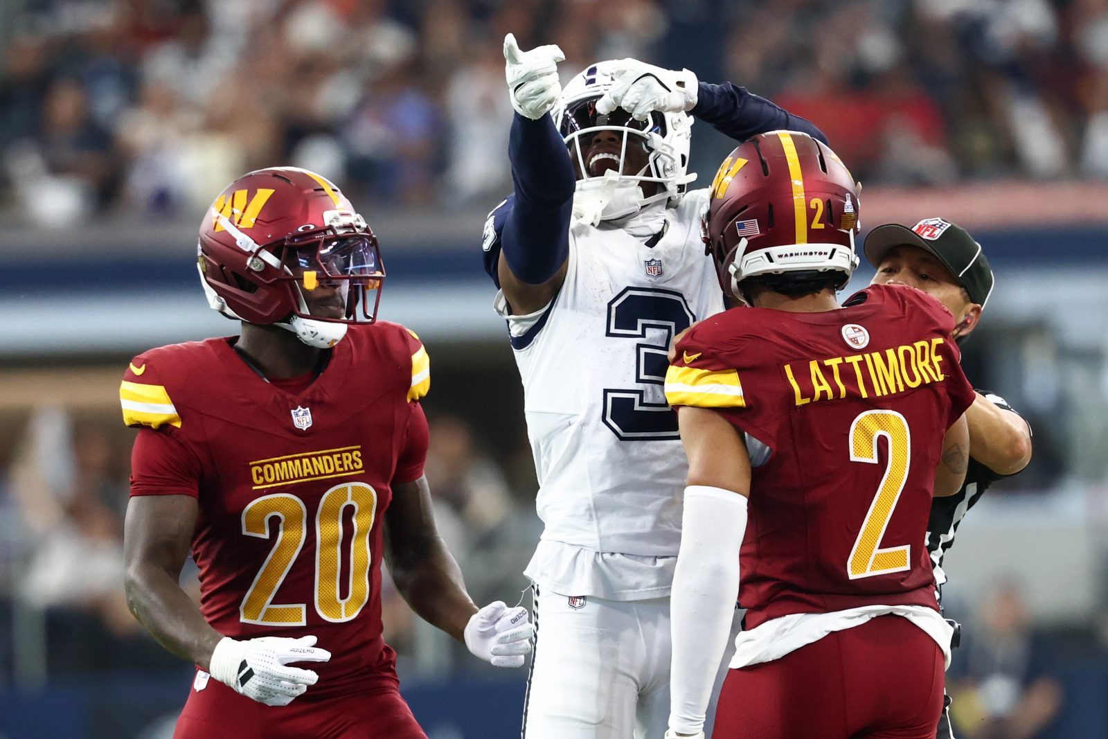 Oct 19, 2025; Arlington, Texas, USA; Dallas Cowboys wide receiver George Pickens (3) celebrates after a play as Washington Commanders safety Quan Martin (20) and cornerback Marshon Lattimore (2) look on during the second quarter of the game at AT&T Stadium. Mandatory Credit: Kevin Jairaj-Imagn Images
