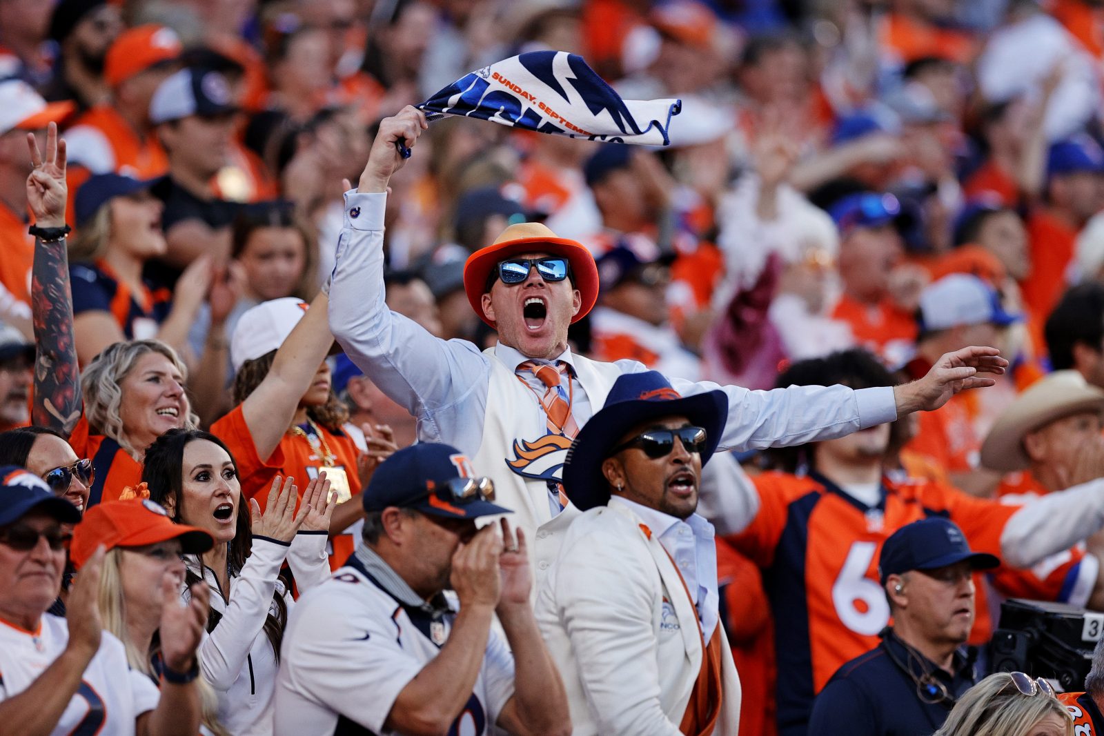 Oct 19, 2025; Denver, Colorado, USA; Fans celebrate the Denver Broncos win against the New York Giants at Empower Field at Mile High.